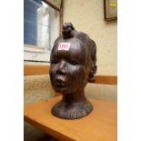 Ethnographica: a carved wood head, 27cm high.