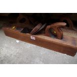 Four old woodworking planes.