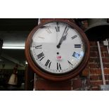 A pine circular wall clock, 38cm diameter.