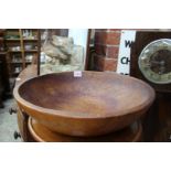 A large turned wood bowl, probably sycamore, 42cm diameter.