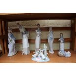 Six Lladro figures, largest 27cm; together with a Nao figure group of three geese.