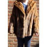 A ladies short brown fur coat, labelled 'Tamara Furs, 78 New Bond Street,