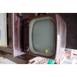 A Bush Type 62 brown Bakelite television.