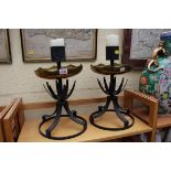 A pair of brass and black painted candlesticks, 41cm high.