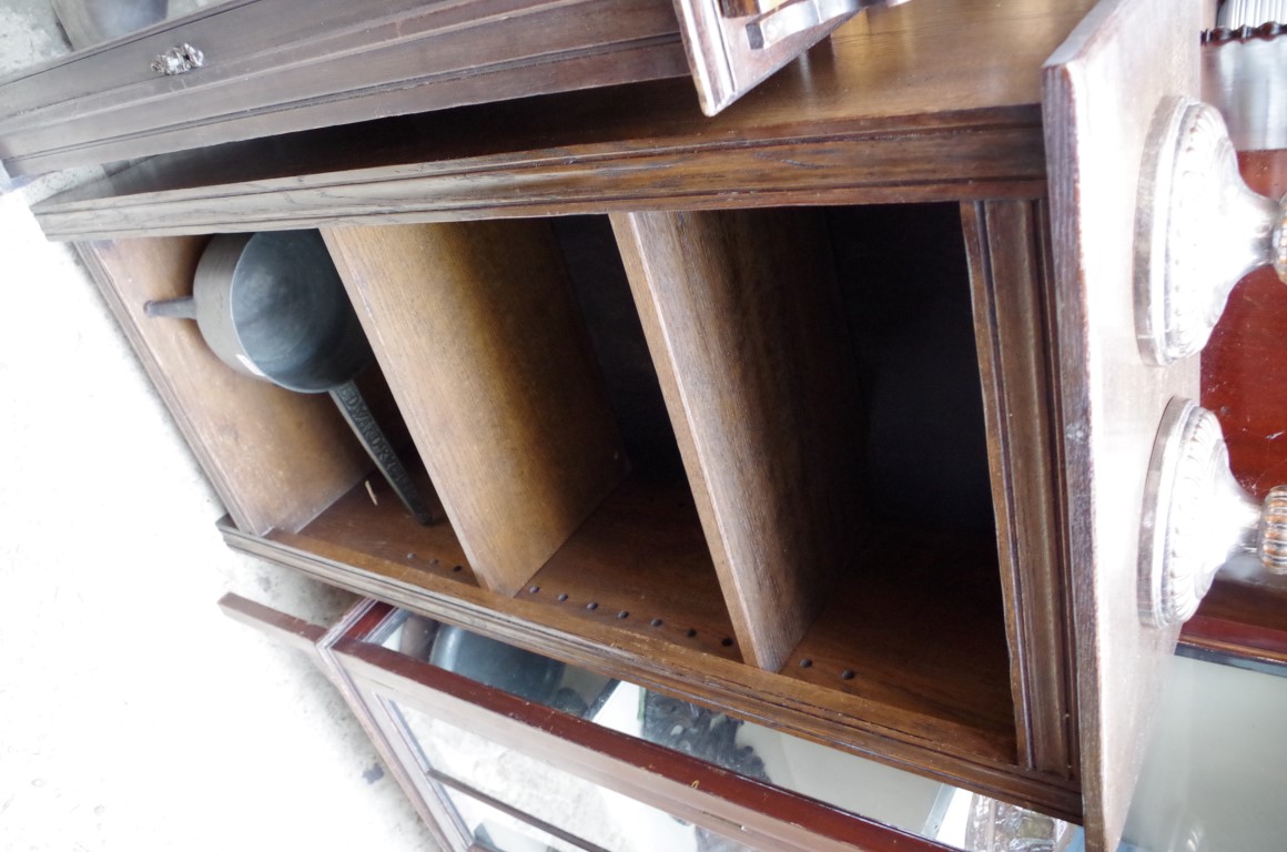 An oak narrow bookcase, 51cm wide.