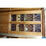 A pair of modern pine bookcases, each with a pair of leaded glazed doors, 90cm wide.