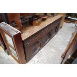 An old oak carved coffer, 158cm wide.