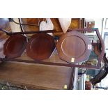 A 1920s mahogany folding three tier cake stand.