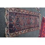 An Afghan prayer rug; together with a South Persian tribal rug,