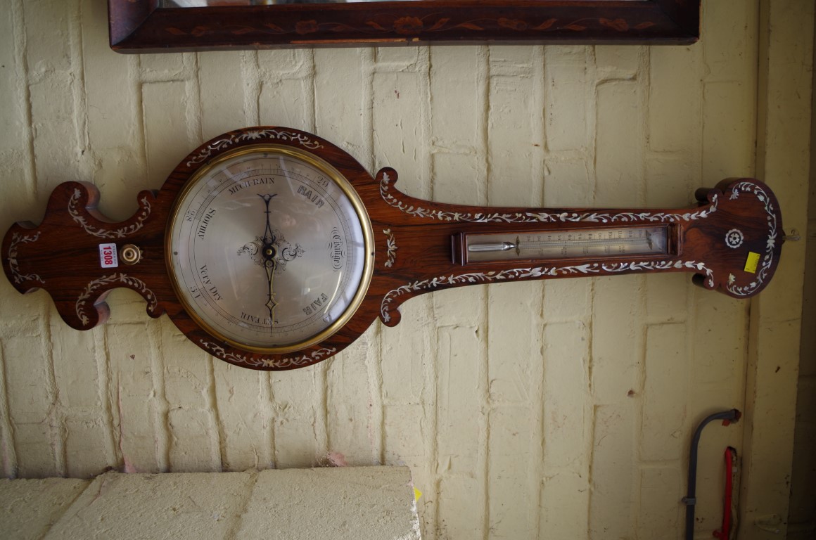 A Victorian rosewood and mother of pearl wheel barometer, 103cm high.