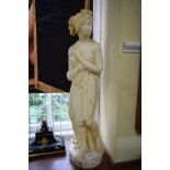 A late 19th century carved alabaster figure of a classical female, 73.5cm high.