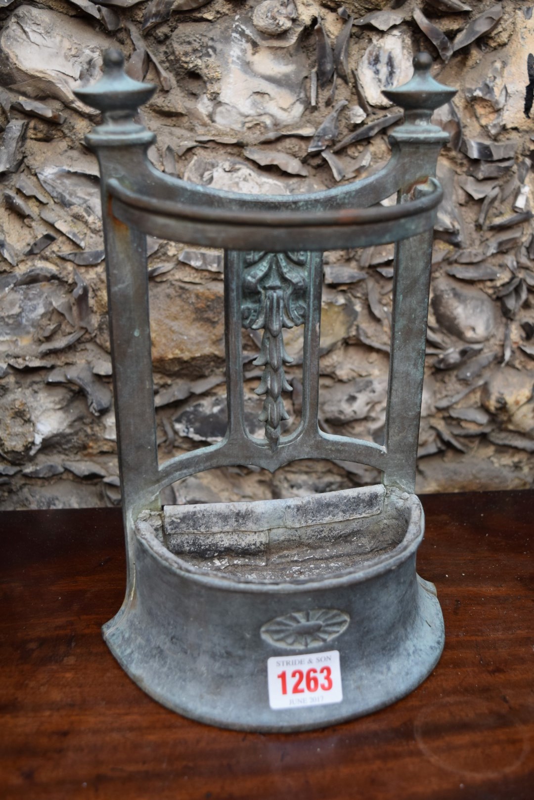 An unusual bronze miniature stick stand, 26.5cm high.