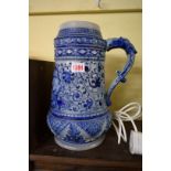 A large German salt glazed stein, 31cm high, (handle restuck).