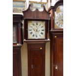 A George III oak and ebonised strung eight day long case clock,