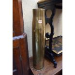 A large brass shell case, 70cm high. Condition Report: Denting both sides of top rim.