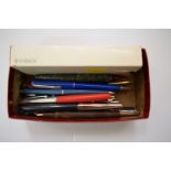 A collection of pens to include; a boxed Parker fountain pen; a Cross propelling pencil;