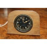 An RAF MKIIC dash clock, the dial inscribed 'Ref No 6A1104'.