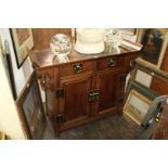 A Chinese hardwood side cabinet, 104cm wide.