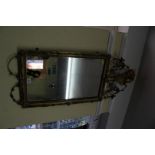 A neo-classic gilt wood and gilt gesso framed pier mirror, 97 x 38.5cm.