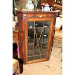 A George III mahogany and line inlaid hanging corner display cupboard, 79.5cm wide.