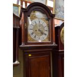 An antique oak eight day long case clock,