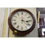 An antique walnut circular wall clock, with fusee movement and 10in painted dial.