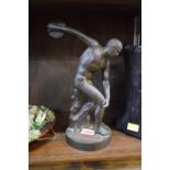 After the Antique, a bronze figure of Discus, with inscribed Continental plaque, 27cm high.