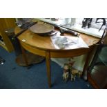 A pair of early 19th century mahogany demi-lune pier tables, 121.