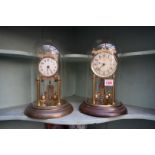 Two Anniversary clocks, one by Kundo.