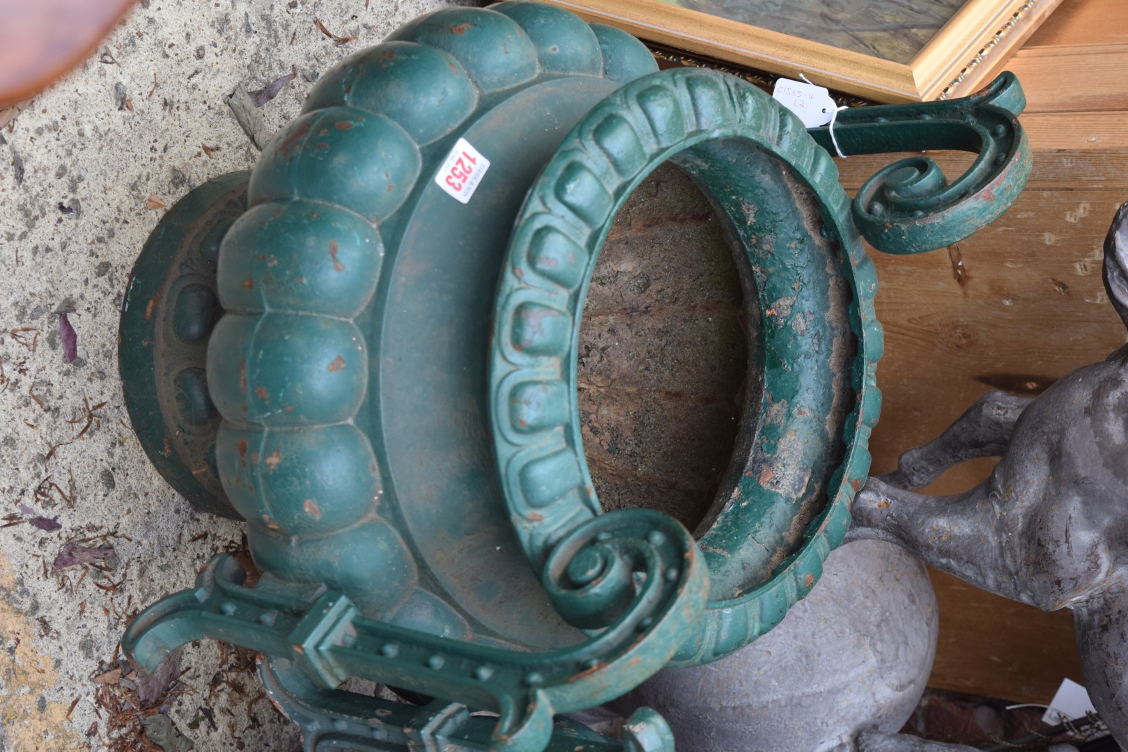 A pair of antique green painted cast iron twin handled urns, 48.5cm high. - Image 2 of 5