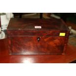 A George III mahogany and crossbanded tea caddy, 30.5cm wide.