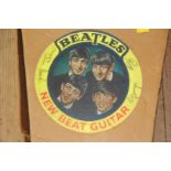 A Selcol New Beat Beatles guitar, in card box.