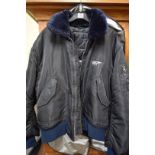 James Bond: a black puffa jacket with faux fur collar,