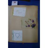 An album of greetings cards, several hundred items pasted down onto thick card leaves of 4to album,