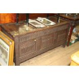 An unusual late 17th century carved oak panelled coffer,