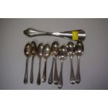 Nine various silver te spoons; and a silver handled shoe horn, 104g weighable.