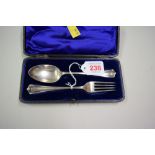 A cased silver christening fork and spoon, by Atkin Brothers, Sheffield 1912, 58g.