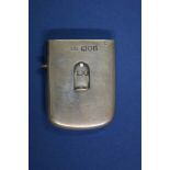 An Edwardian silver vesta case, London 1902, having sliding lid.