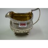 A George IV silver milk jug, London 1815, 203g.