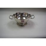 A silver two handled fruit bowl, marks rubbed, 18cm diameter 527g.