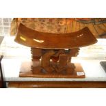 African: an Ashanti carved wooden stool, 37cm diameter.