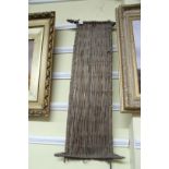 African: a bamboo shield, approx 88cm long.