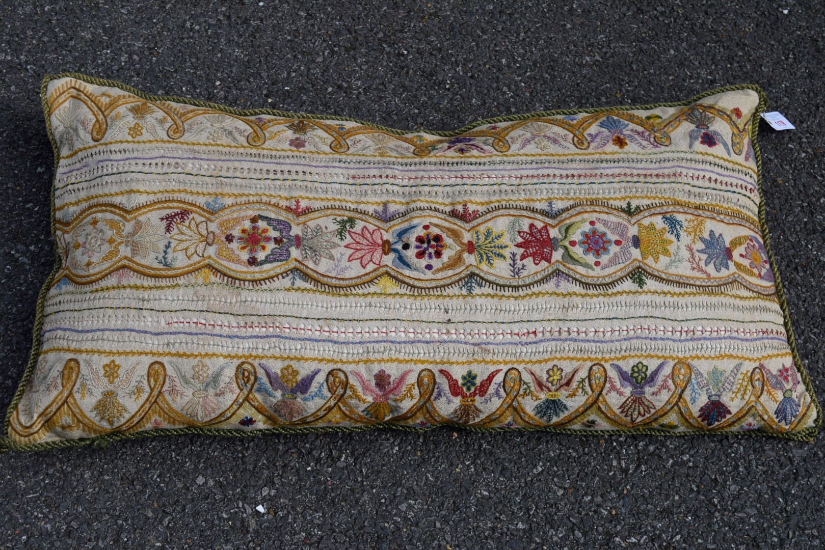 A crewel work cushion with stylised needlework decoration, 92 x 49cm. - Image 2 of 8