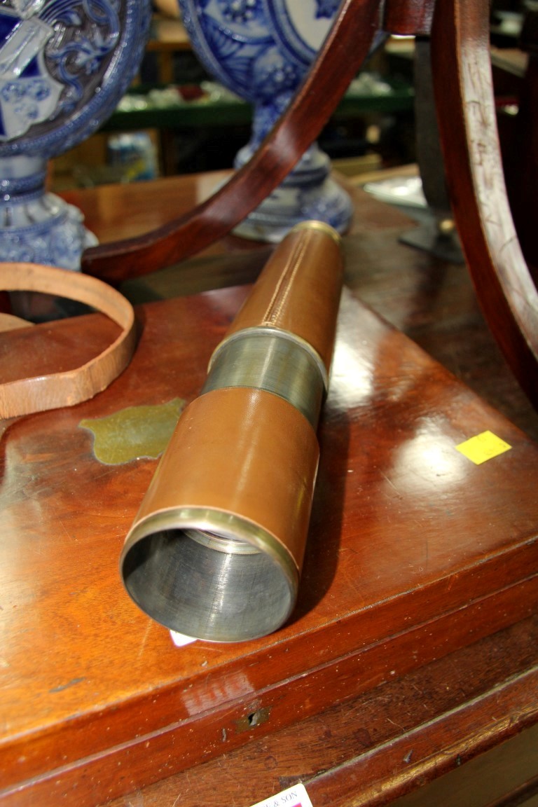 A lacquered brass and leather three drawer telescope, with broad arrow stamp, - Image 11 of 18