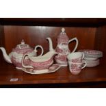 A matched red and white pottery part tea service,