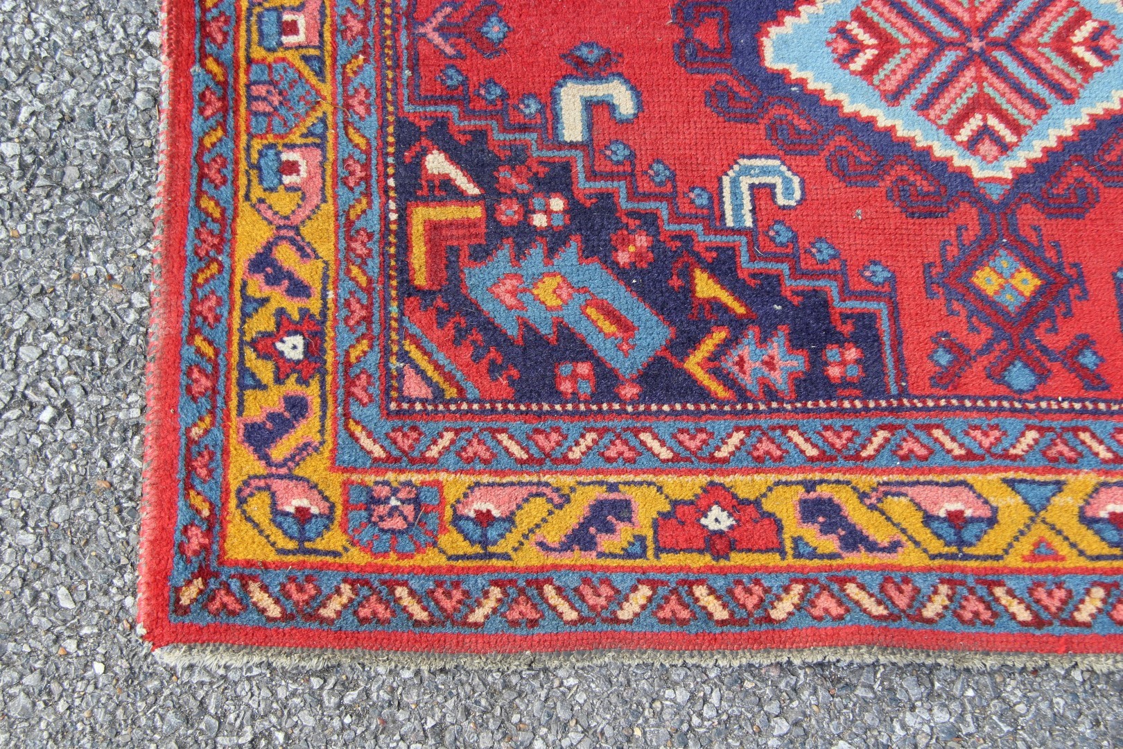 A North West Persian triple medallion rug on a red field, 151 x 105cm. - Image 6 of 16