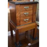 A Victorian walnut small three drawer Wellington type chest, 29cm wide, on later stand.