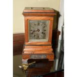 A 19th century satinwood and ebonized library clock, the silver dial inscribed 'Frank Phillips,