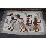 A pictorial flatweave rug, depicting 'Drum beating' by 'Setsoto Ltd',