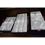 Three boxed sets of six Crystalleries de Lorraine drinking glasses;